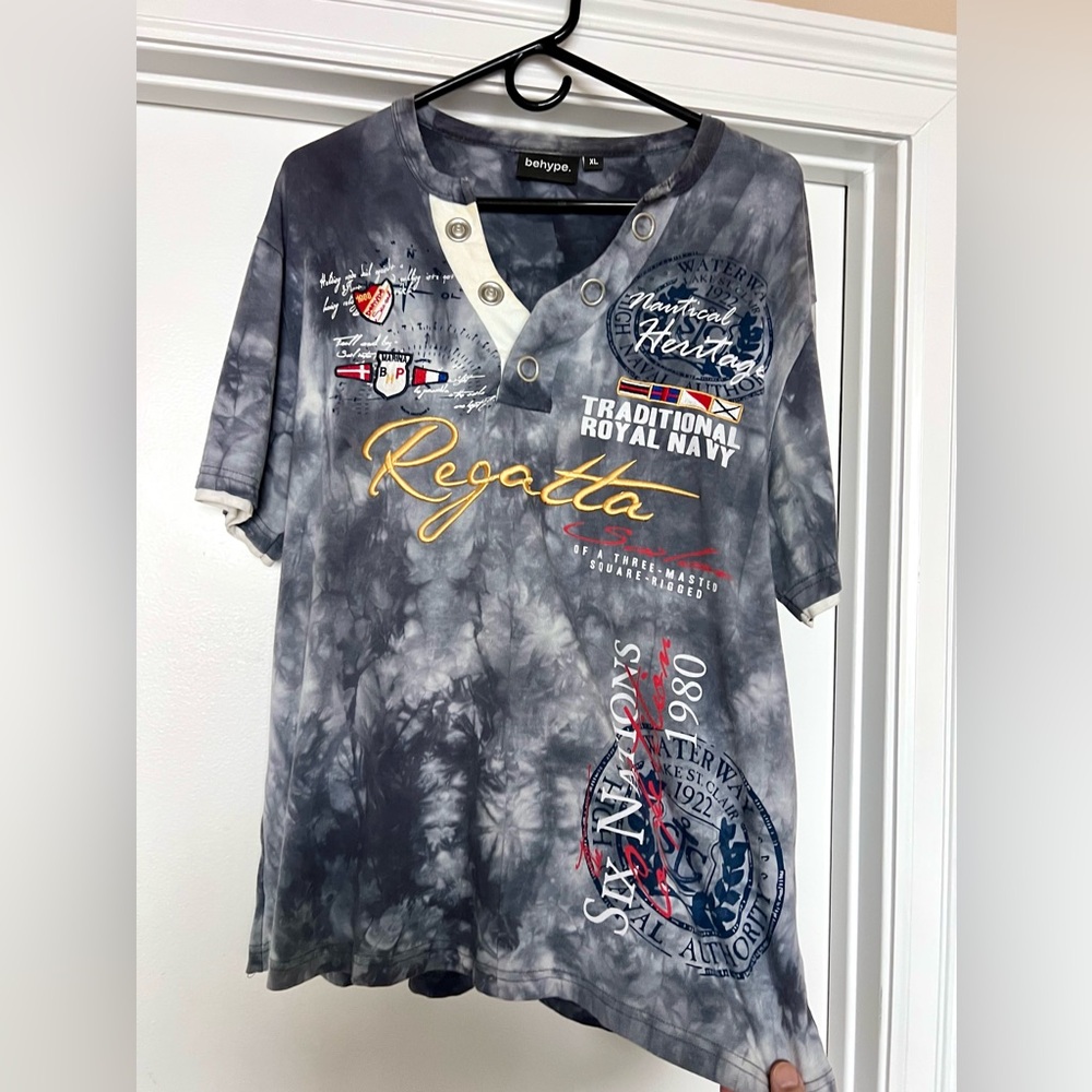 Pull over t-shirt with cool logos and designs!